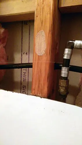 Copper vs plastic water piping image of leaking piping in Wellington