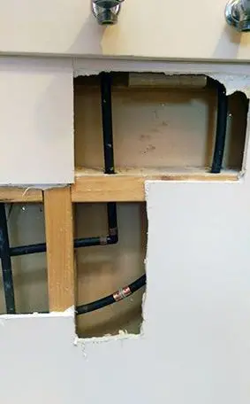 Dux Qest plumbing, Dux quest polybutylene burst pipe in laundry wall Resulted in a call out. Sometimes called Dux Quest, piping replacement.